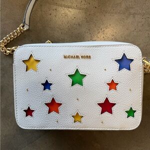 Michael Kors Leather Star Crossbody with Rainbow Accents
Roughly 8.5" x 2.5"